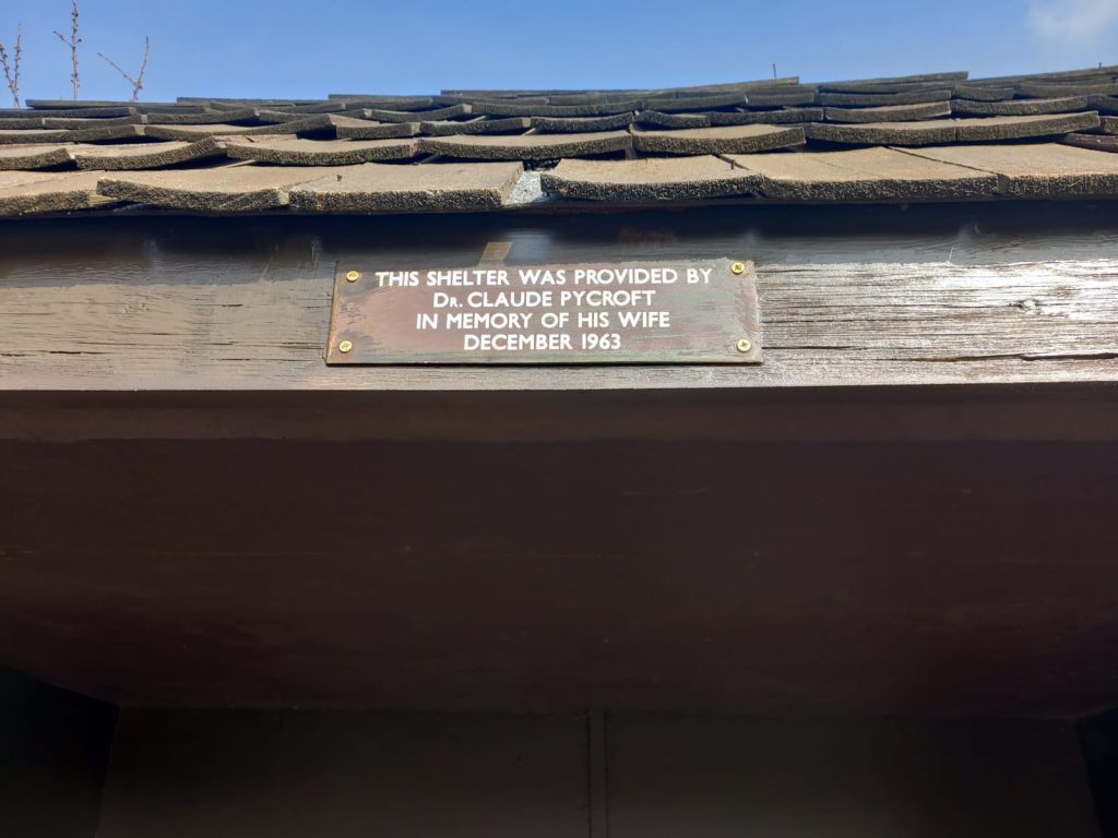 A plaque on Gunter's Lane Bus Shelter detailing its donation from Dr Claude Pycroft.